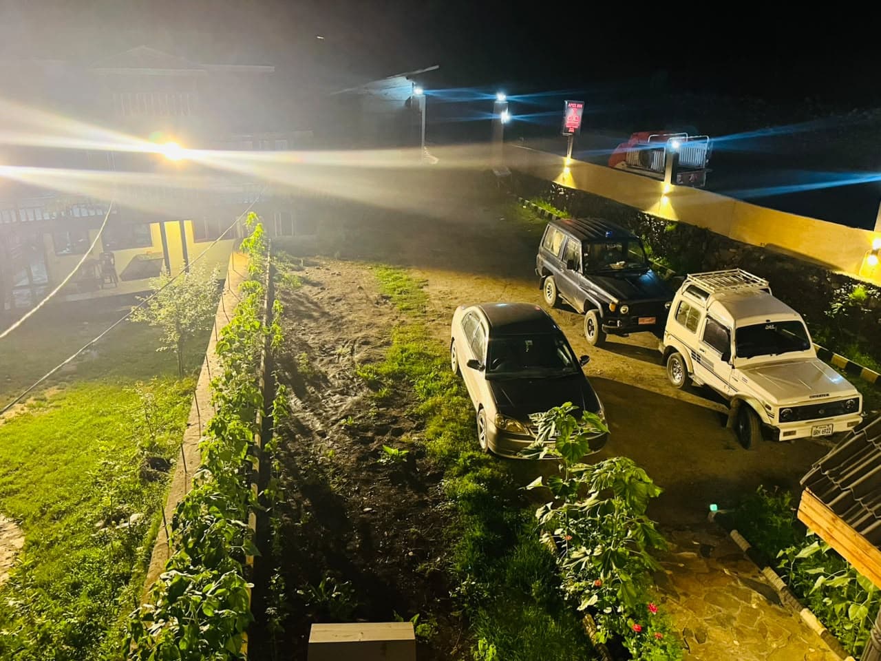 Guest parking at Apex Inn at night